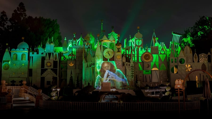 Celebrate Disney's 'Encanto' at Disneyland This Spring with 'We Don't Talk About Bruno' Projects on 'it's a small world' facade